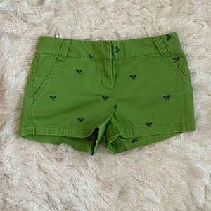 J. Crew green shorts with blue design.
